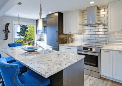 Allied-Gallery-Kitchen-Countertop-With-Blue-Chairs