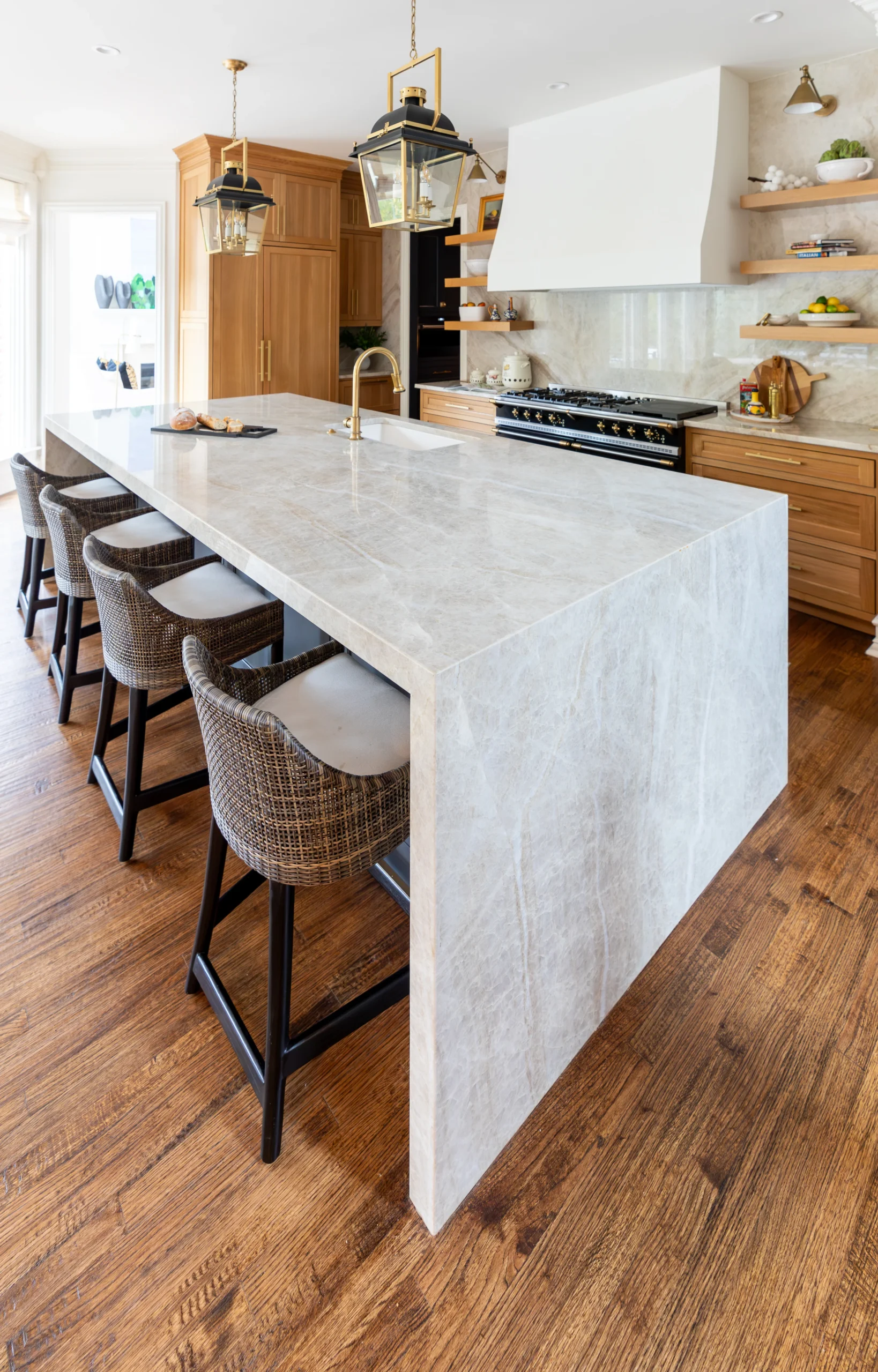 Luxurious kitchen with Taj Mahal Quartzite countertops color pick of the month by our Allied Gallery Austin team