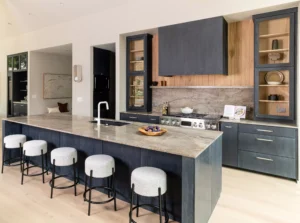 Modern marble kitchen in a Mosier Luxury home, featuring sleek cabinetry and a stylish island, fabricated and installed by Allied Gallery Austin